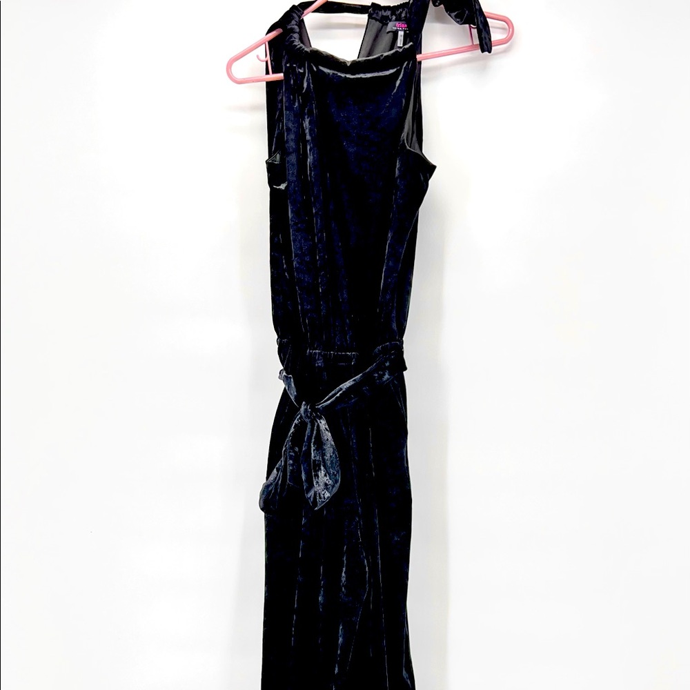 One piece pantsuit in rich black velvet by Trina Turk. Sized medium.